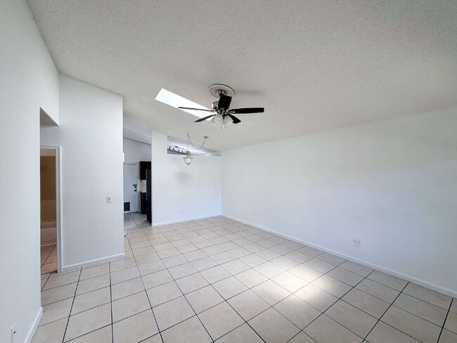 Photo - "Charming 2-Bedroom Townhouse Oasis in West Palm Beach – Cozy 900 Sq Ft at 8715 Pluto Terrace!"