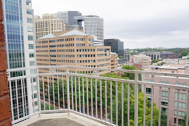 Photo - A Modern Living of Top-Level Unit in the C... House