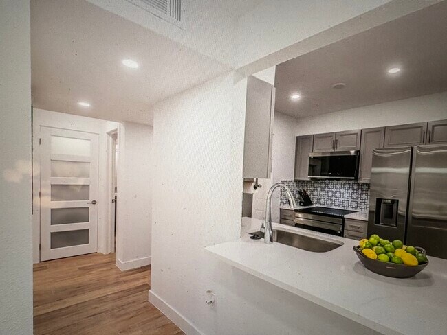 Kitchen into hallway - 4851 Cedar Springs Rd