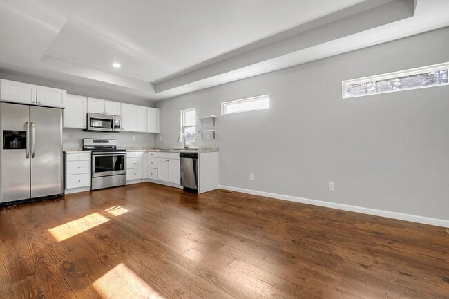 Building Photo - Modern Comfort Meets Prime Location — Stylish 2-Story Townhome