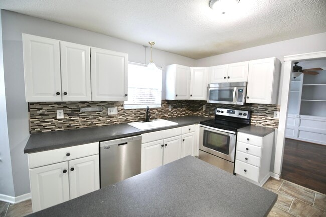 Foto del edificio - 4400 Greensbury Dr