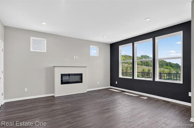 Foto del edificio - Modern 3-Bedroom Condo in Lake Orion Near I-75