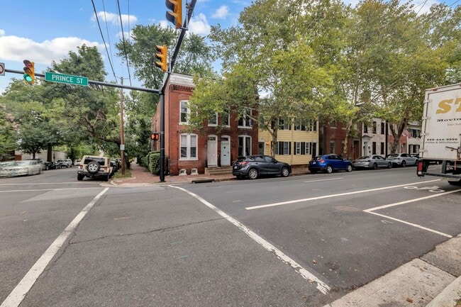 Building Photo - Timeless Brick Rowhome Steps from King Street