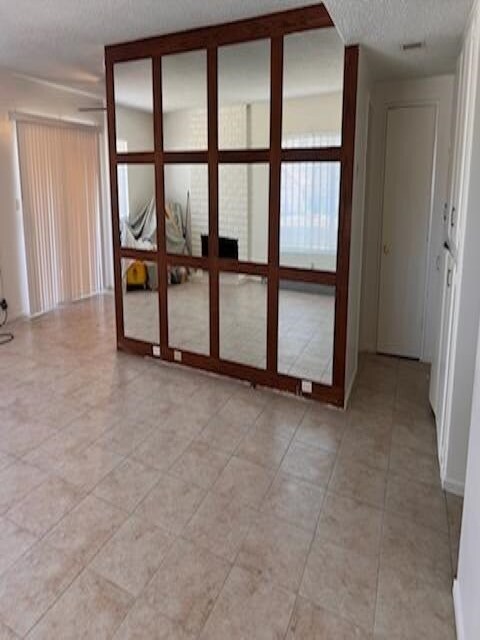 Living room area- view from entrance door. Beautiful mirror - 120 S Sunkist St