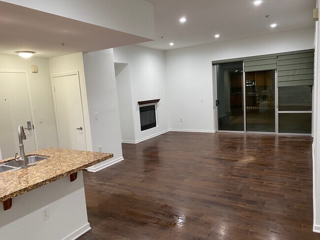 Looking from Dining Room to Family Room to Patio - 111 S De Lacey Ave