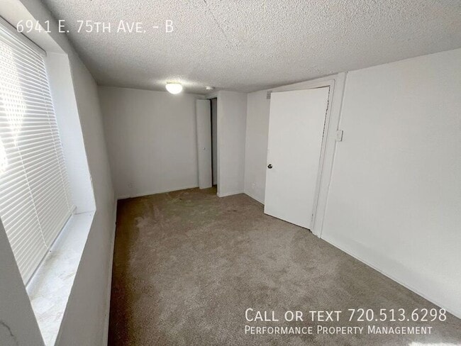 Building Photo - 6941 E 75th Ave