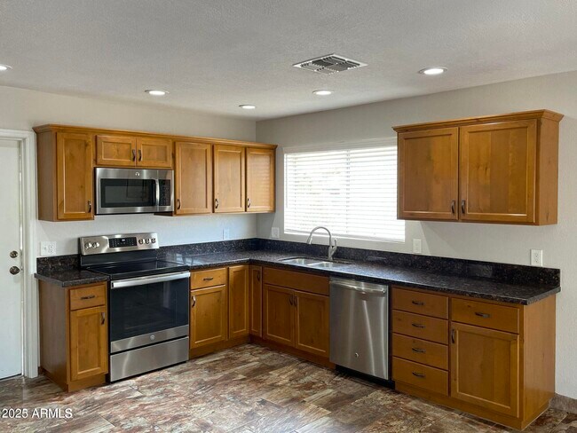 Foto del edificio - 10500 E Mercer Ln