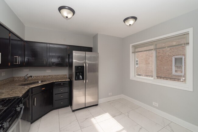Foto del edificio - 6947 S Jeffery Blvd