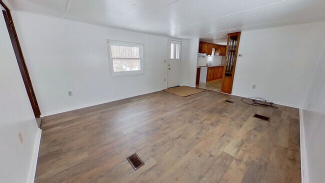 Building Photo - First-Floor Living with Private Wooded Backyard Setting