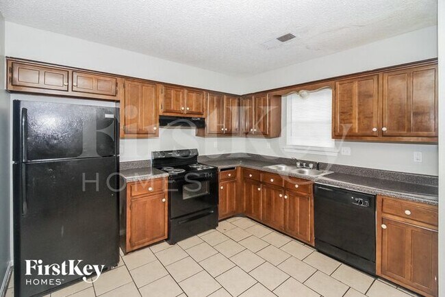 Foto del edificio - 5864 Ridgehill Dr