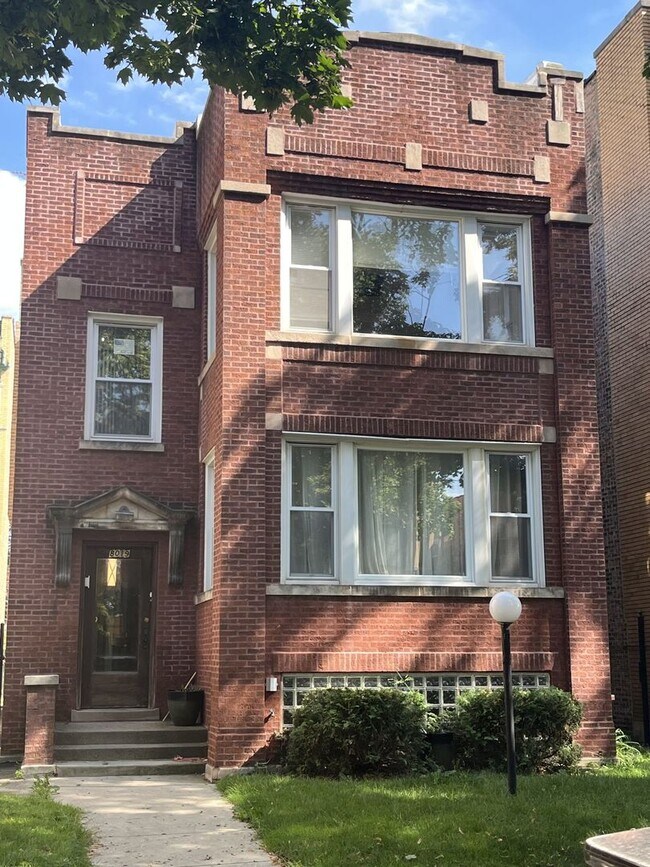 Building Photo - 8019 S Vernon Ave