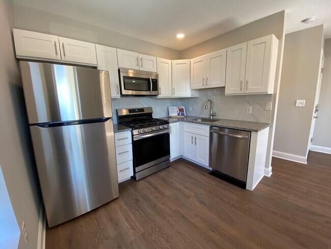 Kitchen with stainless steel appliances - 115 Susquehanna Ave