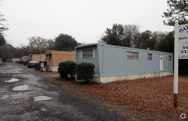 Building Photo - Oak Terrace Village