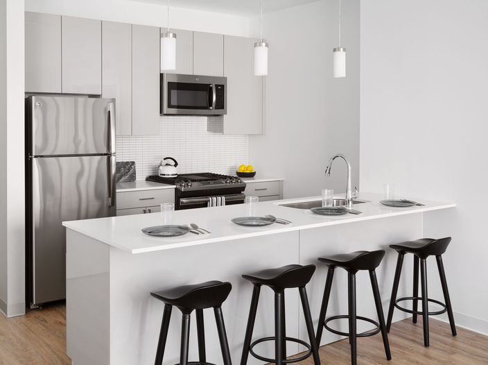 Kitchen with great appliances, white subway tile and quartz countertops - 412 S Peoria St