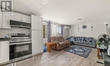 Building Photo - 89 College St E