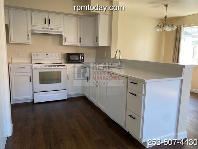 Foto del edificio - Bright and Inviting 2-Bedroom Townhouse in...