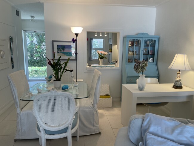 Dining area. Desk area - 3851 N Ocean Blvd