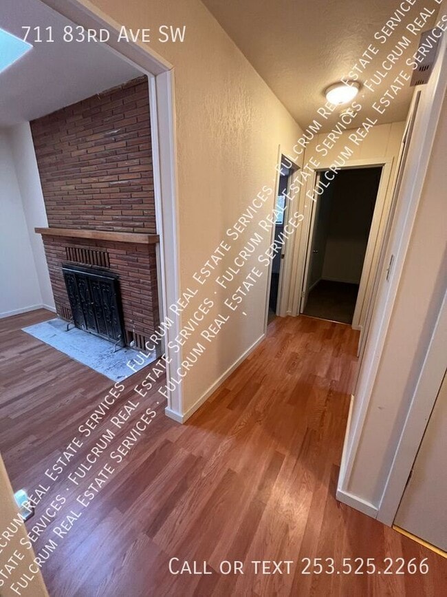 Building Photo - 711 83rd Ave SW
