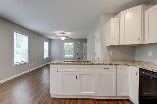Building Photo - Two Story Duplex With Hardwood Flooring and White Cabinetry
