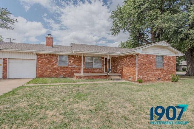 Photo - Spacious 2-Bedroom Home with Hardwood Flooring and Brick Fireplace in OKC!