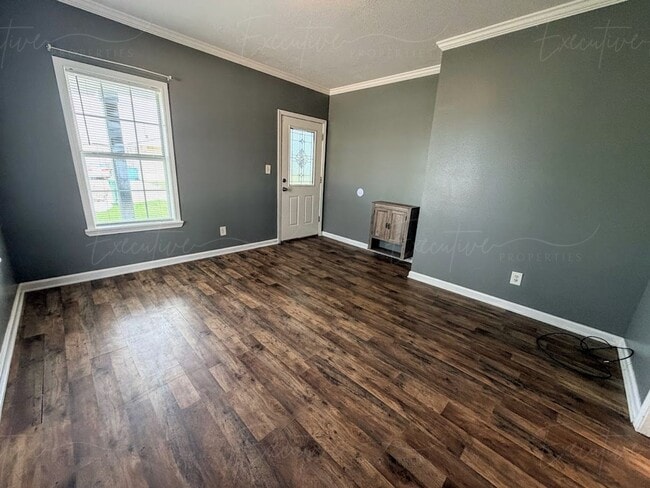 Building Photo - Move-In Ready in Sulphur | Updated 2BR Home w/ Covered Front Porch + Granite Countertops