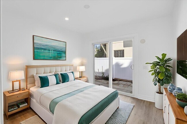 staged 2nd bedroom w/entrance to the side yard & to studio room - 1185 S Tremaine Ave