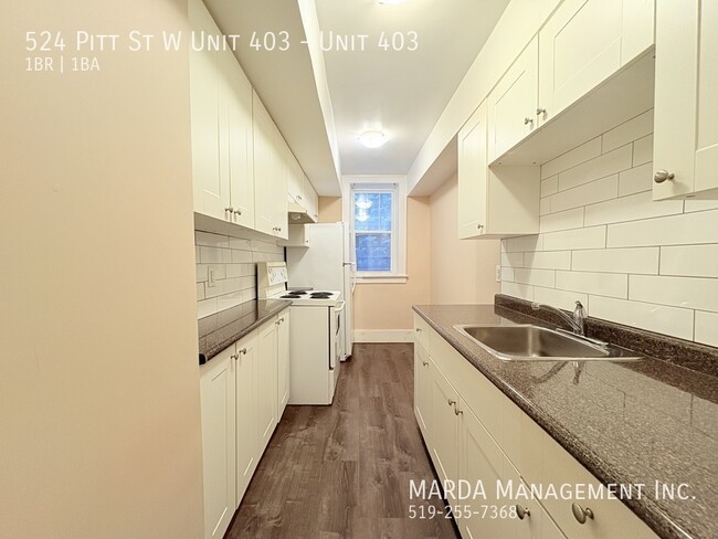 Photo du bâtiment - COZY 1BED/1BATH APARTMENT DOWNTOWN WINDSOR...