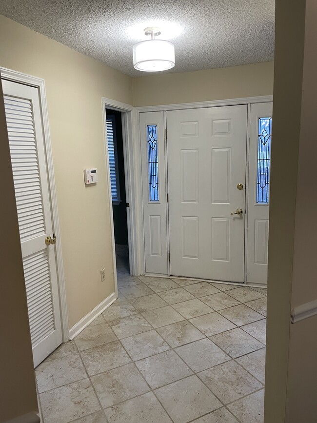 Inside Entry Foyer w/Doors to Guest Bath & Laundry - 762 McGill Pl NE