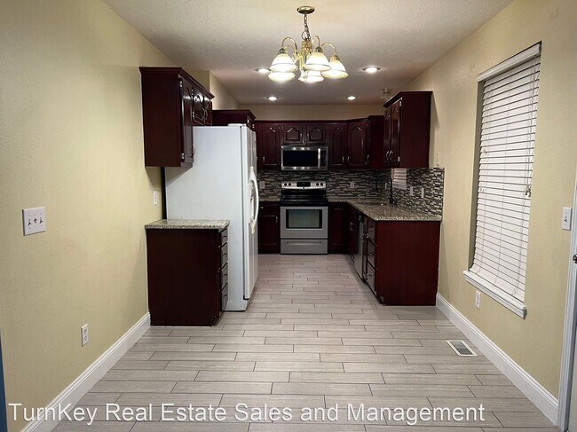 Foto del edificio - 4 br, 3 bath House - 4451 W University