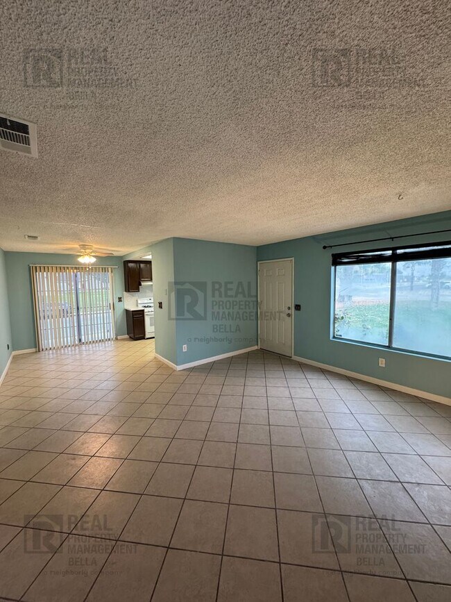 Building Photo - 55+ COMMUNITY- Charming 2-Bed, 2-Bath Home in Desirable 55+ Sunrise Community