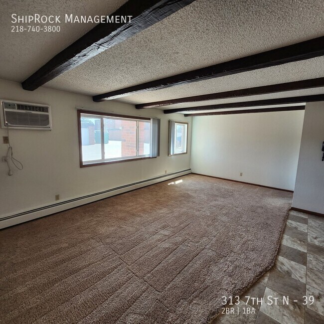 Building Photo - 313 7th St N