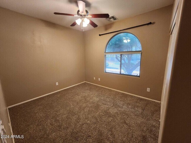 Building Photo - 7643 W Charter Oak Rd