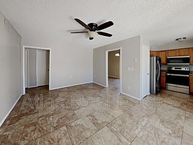 Building Photo - 9855 N 56th Dr
