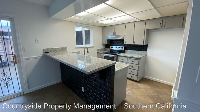 Building Photo - 3 br, 1.5 bath House - 5188 E. Ashlan Aven...