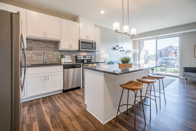 At Ascend at Woodbury, we offer modern interiors with open layouts and stylish finishes throughout your home. - Ascend at Woodbury