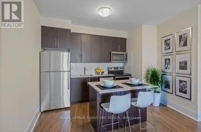 Photo du bâtiment - 105 Harrison Garden Blvd