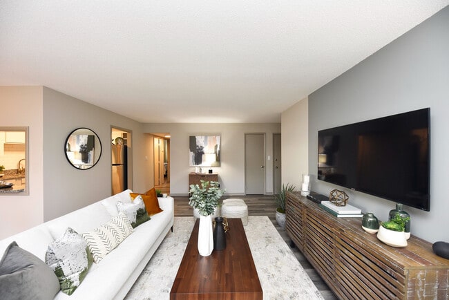 Experience the elegance of this modern living room, designed with style and comfort in mind. - Edison at Meridian Hills