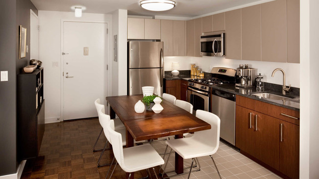 Kitchen with Dishwasher and Stainless Steel Appliances - The Brooklyner