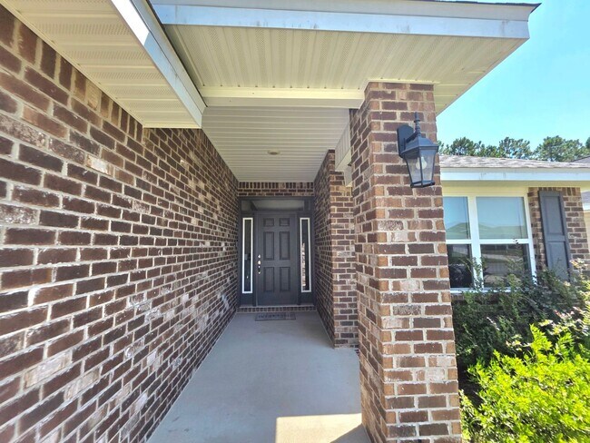 Building Photo - Spacious 4BR Home Near Navy Federal & UWF ...