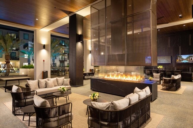 Unwind outdoors in comfort with fireside vibes and open-air lounging at The Piazza - The Sterling at Regent Square