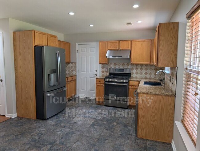 Foto del edificio - 9935 Redbud Tree Ct