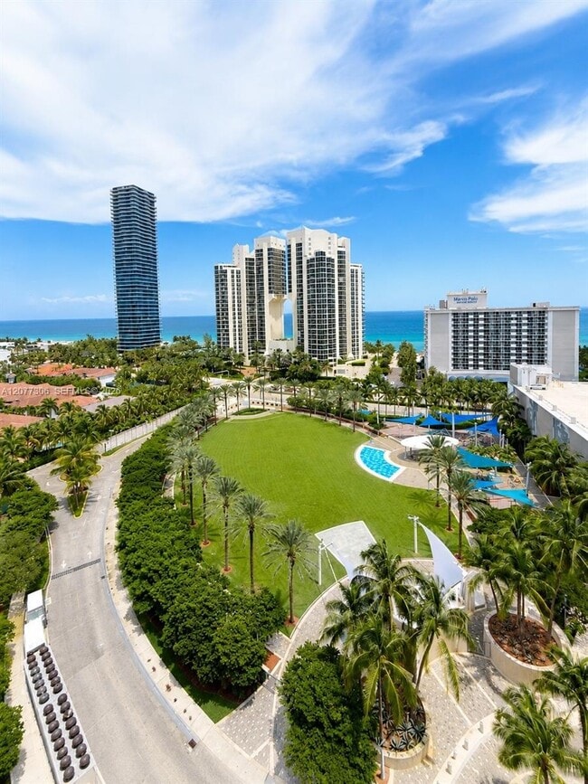 Building Photo - 19370 Collins Ave