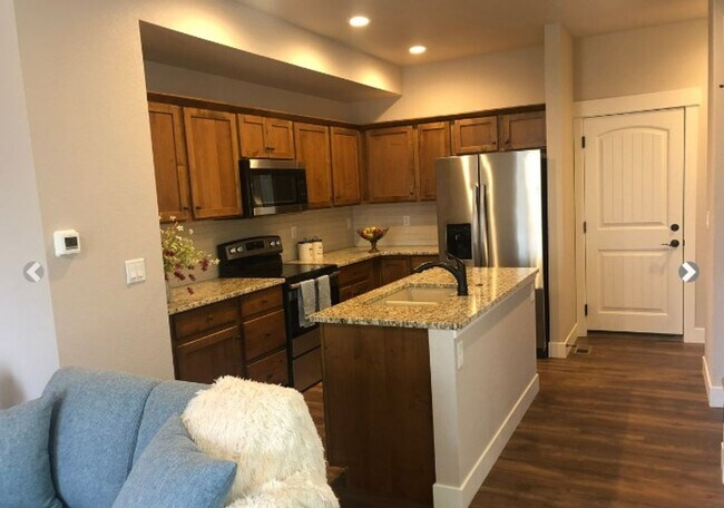 Building Photo - Eaton Oasis- Your Ultimate Modern Townhome...