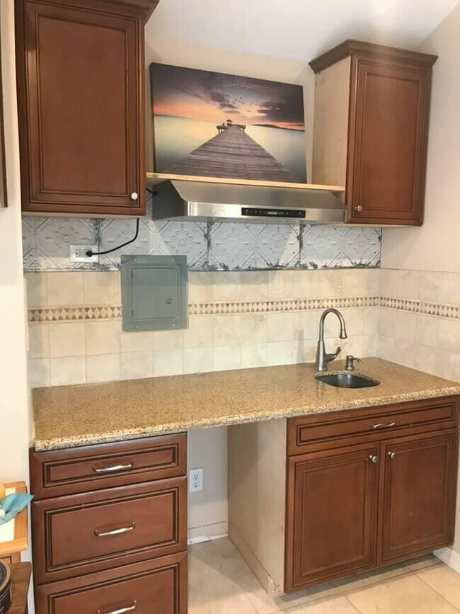 kitchenette available with electric stove for cooking - 4792 Mount Abbott St