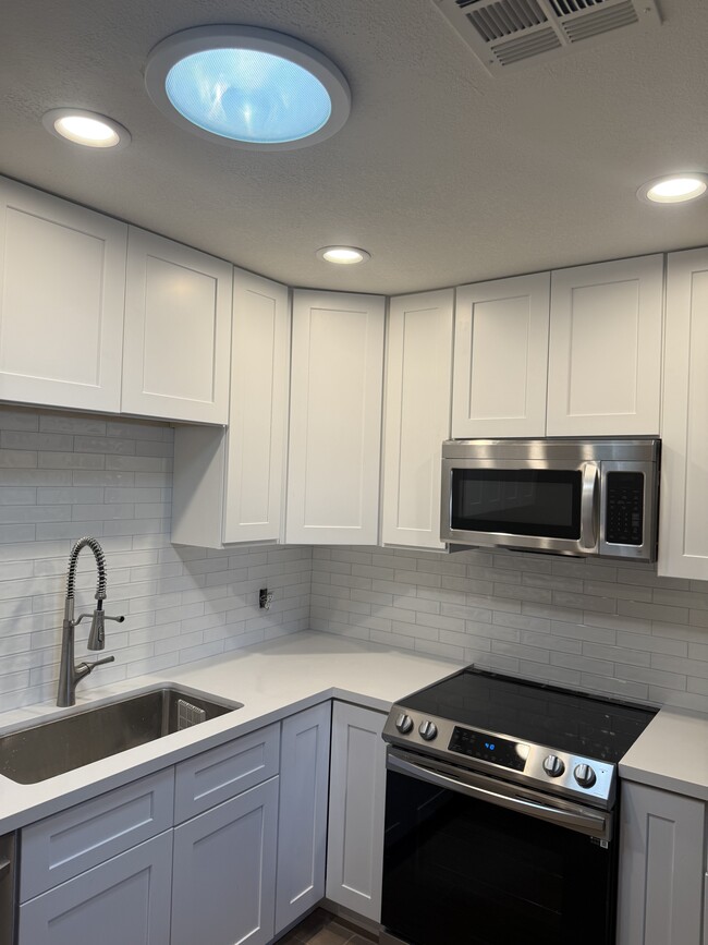 Built-in trash/recycle pull-out; spice rack built-in - 2513 N 28th St
