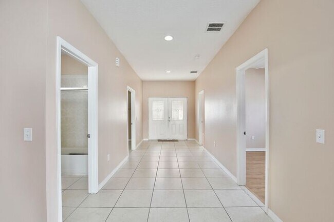 Photo - Spacious 4/2 Home with a Large Fenced Backyard and a 2 Car Garage Located in Buena Ventura Lakes ...