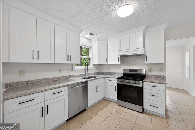 Foto del edificio - 6898 Babbling Brook Dr