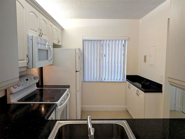 Photo - 6550 Somerset Drive Apt #104A, Boca Raton, FL 33433 - 2 BR 2 BA condo