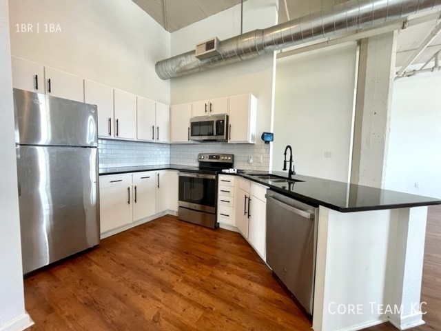 Primary Photo - Top floor Loft with River View!