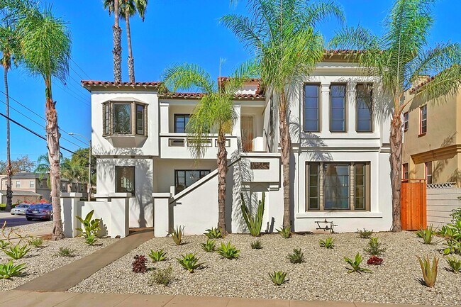 Situated on a bright corner lot in a beautiful pocket of Los Angeles - 1143 S Cloverdale Ave